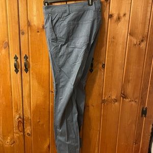 Blue stretch fit pants presented by Columbia